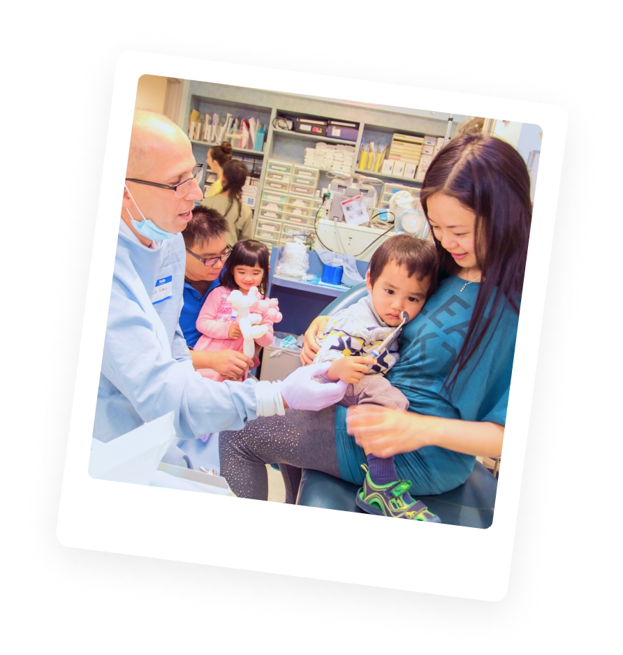 Family gathered at the dentist for a checkup.